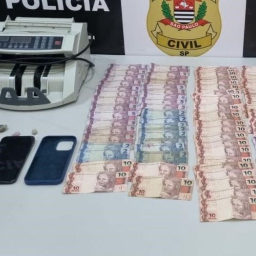  1 de 1Máquina de contar dinheiro foi apreendida junto com mais de R$ 2 mil em Praia Grande (SP) — Foto: Divulgação/Polícia Civil 